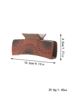 Brown PU leather hair claw clip with sunflower pattern and size measurements