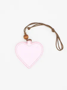 Close-up view of a pink heart-shaped PU leather glasses clip with a brown neck strap