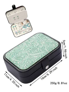Detailed view of the vintage Western style jewelry box with embossed floral lid