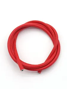 Close-up of red PU leather stitched cord with cross texture for DIY projects and crafts