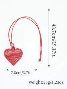 Red heart-shaped PU leather magnetic glasses clip with size and weight dimensions