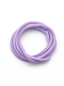 Macro detail of purple cross-grain PU leather cord with stitching for DIY crafts