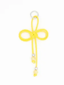 Detailed view of a handmade yellow braided PU cord pendant accessory with silver beads