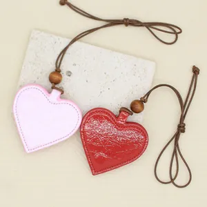 Heart-shaped PU leather glasses clip pendant with magnetic buckle and neck cord