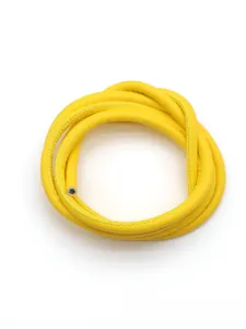 Macro detail showing texture of yellow cross-grain PU leather cord for DIY crafts