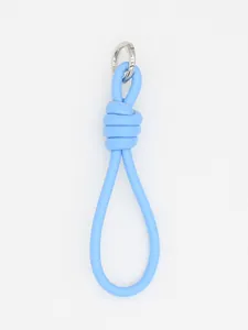 Macro view of light blue braided PU leather lanyard keychain with silver metal ring