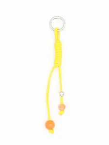 Detailed view of a handmade yellow woven PU rope keychain with bright orange beads