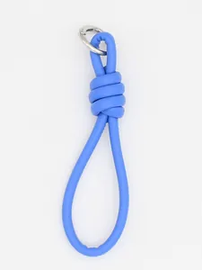 Close-up showing the knotted detail of a blue PU leather braided wrist strap keychain