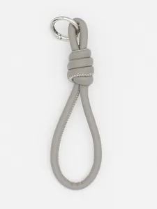 Grey PU leather braided strap keychain with silver metal ring and white stitching detail