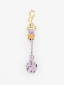 Vertical view of a lavender hand-woven ball bag charm with a wood bead and gold metal clasp.