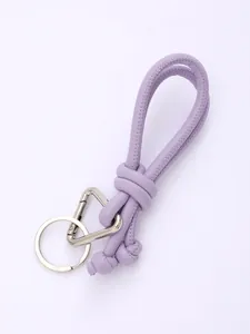 Detailed view of the purple handmade woven PU leather strap with silver metal hardware