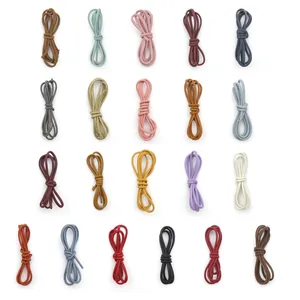 Detailed view of colorful stitched round leather cords with matte frosted finish for DIY crafts