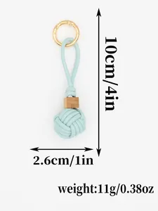 Detailed size and weight measurements of light blue PU leather woven ball keychain bag charm