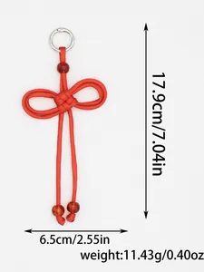 Detailed view of handmade braided red rope pendant with weight and size annotations