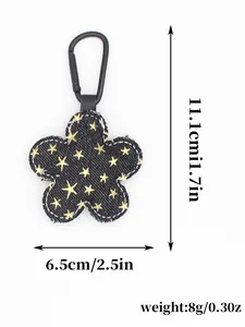 Vista detallada del llavero de flor de mezclilla con altura de 11,1 cm y peso de 8g.