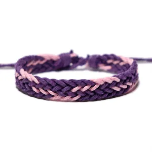 Detailed macro view showing the intricate purple and pink braided wax rope craftsmanship