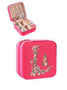 Floral embroidered letter L jewelry box with butterfly detail and internal storage