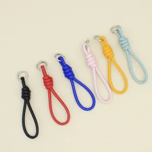Set of colorful PU leather braided keychain wrist straps with silver metal rings for bags