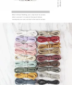 Macro view of various colorful matte round leather cords for DIY sewing and jewelry crafts