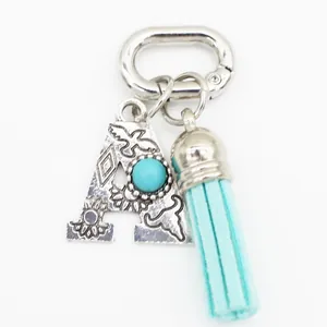 Ethnic turquoise initial letter A keychain with light blue tassel bag charm accessories.