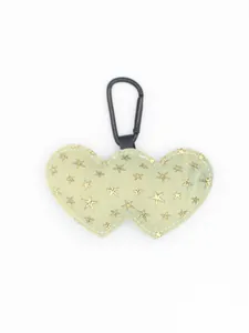 Detailed view of a pale green double heart fabric keychain featuring gold stars.