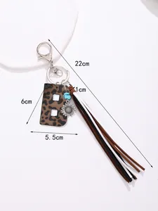 Detailed dimension view of leopard print leather letter B keychain with long tassels
