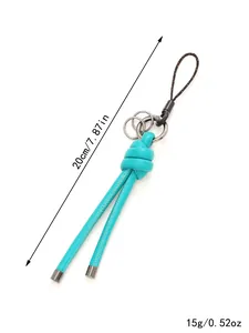 Detailed view of handmade braided leather rope keychain, 20cm length and 15g weight