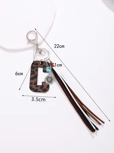 Detailed dimension view of leopard print leather letter C keychain with stylish tassels