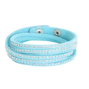 Detail view of a light blue multi-strand PU leather bracelet with clear rhinestones