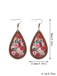 Detail view of bohemian teardrop wooden earrings with size and weight measurements.