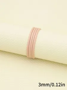 Detailed macro view of 3mm pink faux sheepskin stitched cord for DIY jewelry making