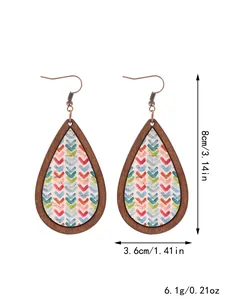 Bohemian wooden teardrop earrings with dimensions 8cm by 3.6cm and weight 6.1g.