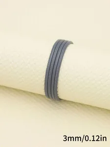 Macro detail of 3mm grey faux leather stitched cord for handmade jewelry DIY projects
