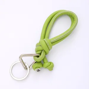 Handmade braided PU leather phone lanyard with metal clip in vibrant green