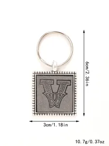 Detail of square leather keychain with embossed letter W including size and weight measurements