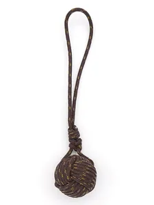 Detailed view of a handmade brown polyester Monkey's Fist knot pendant charm