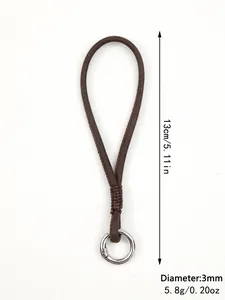 Detail view of handmade brown leather phone wrist strap with dimensions and weight specs