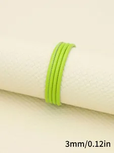 Close-up view of 3mm neon green faux sheepskin stitched cord for DIY jewelry making