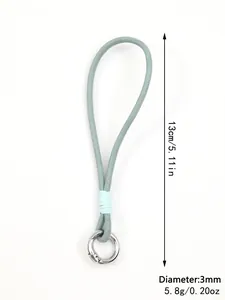 Detail view of light blue braided phone wrist strap with 13cm length and silver ring clasp