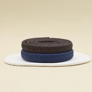 Close-up detail of 12-strand vintage braided PU leather cords in brown and navy blue.