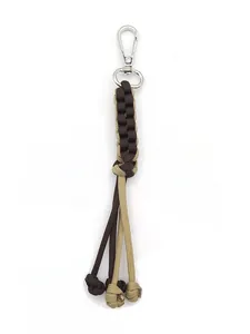 Detailed view of bicolor braided paracord corn knot keychain with silver lobster clasp.