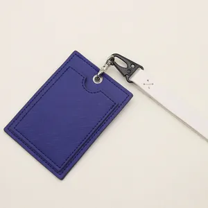 Detail view of navy PU leather ID card holder with textured finish and white lanyard