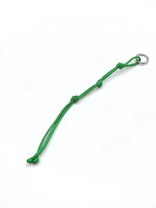 Close-up view of a green hand-woven polyester rope keychain with a silver metal ring.