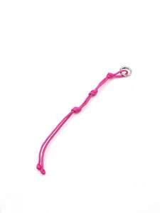 Close-up detail of handmade pink woven polyester rope keychain with metal ring
