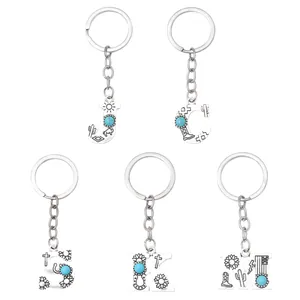 Western style alphabet alloy keychains with turquoise stones and bohemian carvings for car bags