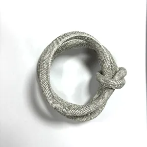 Detailed view of grey textured PU leather cord with cross-stitch for DIY crafts.