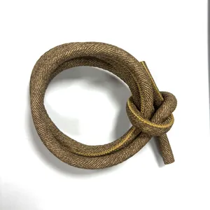 Close-up of brown stitched PU leather cord with cross-grain texture for DIY crafts
