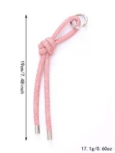 Portachiavi intrecciato in denim rosa con anello argento, lungo 19 cm e pesa 17 g.