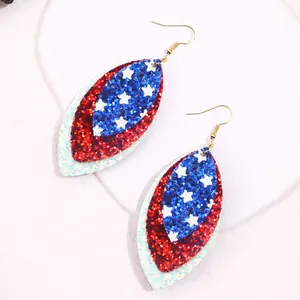 Detailed view of patriotic multi-layer glitter leaf earrings with American flag motif