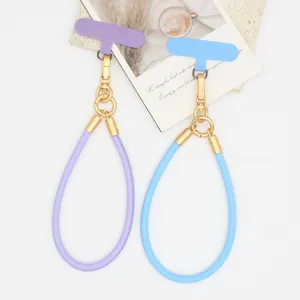 Minimalist PU Leather Phone Lanyard Keychain Multifunctional Hand Wrist Strap with Gold Metal Clasp and Patch for Women